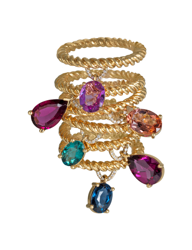 Les Z'Amourettes : un anneau d'or jaune, support d'une tourmaline, saphir, grenat ou diamant en suspension.